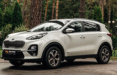 Kia Sportage 4WD (белый) 